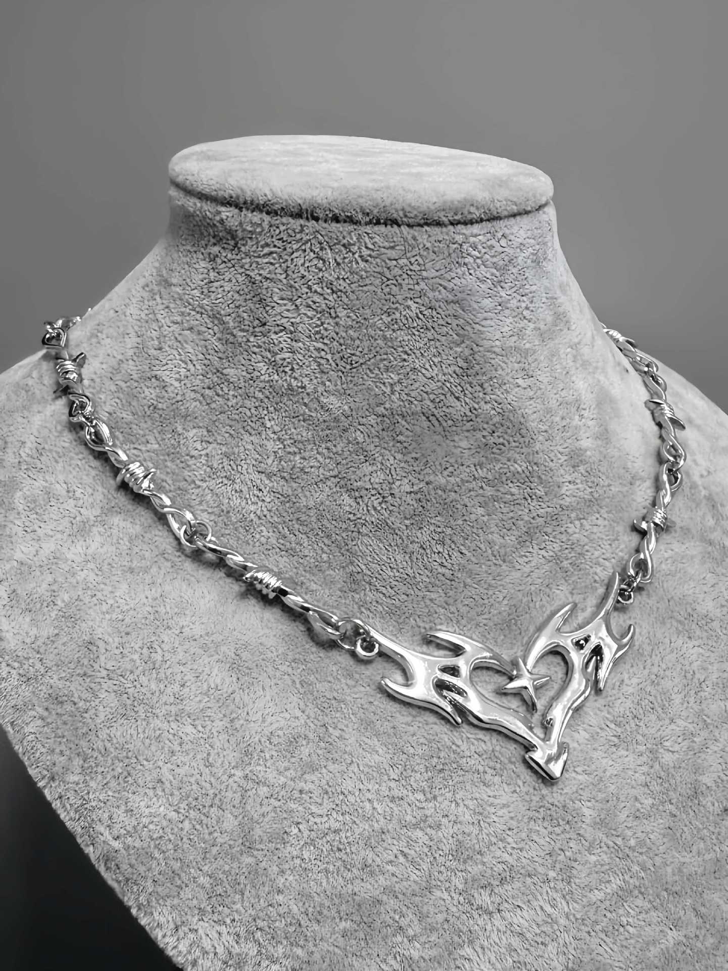 Wholesale Hollow flame totem heart small iron necklace hip hop clavicle chain accessories